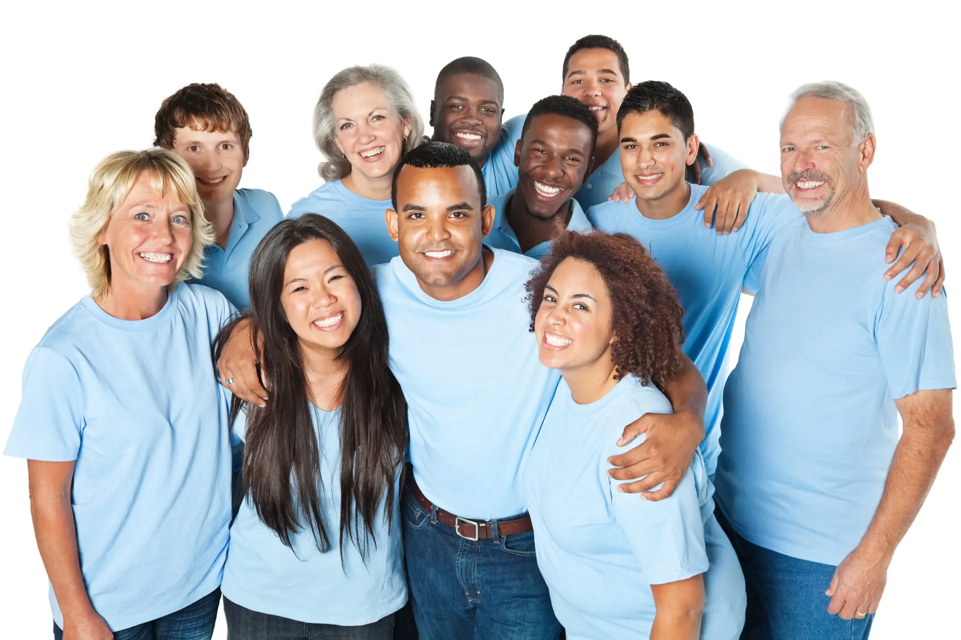 Close group of people together, all in blue shirts